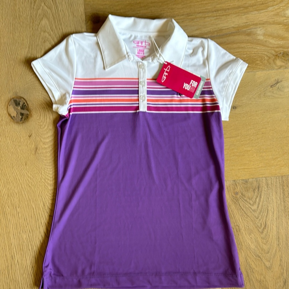 NEW WITH TAGS, girls golf polo size 9-10. No rips, stains nor tears